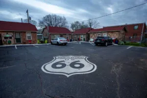 Route 66 shield on the asphalt at Rockwood Motor Court in Springfield, Missouri Route 66 motel