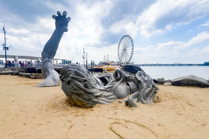 The Awakening Sculpture in National Harbor, Maryland - J Seward Johnson sculpture