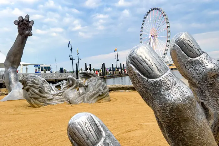 The Awakening Sculpture in National Harbor, Maryland - J Seward Johnson sculpture