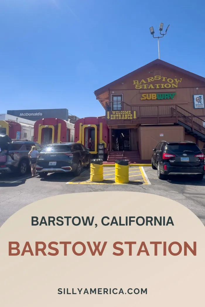 Barstow Station in Barstow, California is a one-of-a-kind Route 66 stop built from old rail cars in 1975. It’s home to more than a dozen vendors, including McDonald’s, Subway, Popeye’s, Wetzel’s Pretzels, Dunkin’ Donuts, Jed’s Jerky, Alien Boba, and quirky souvenir shops. Greyhound and FlixBus stop here, and across the road you’ll find one of the largest Tesla charging stations in the country. A fun, functional stop on the Mother Road. #Route66 #Route66RoadTrip #RoadsideAttraction
